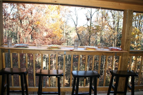 Spring has Sprung! Cozy up by the fireplace in this Cabin in the Heart of Nature