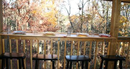 Spring has Sprung! Cozy up by the fireplace in this Cabin in the Heart of Nature