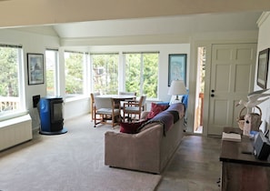 Living room with a view & gas stove