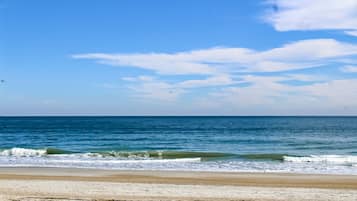 On the beach, sun loungers, beach towels
