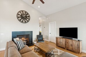Smart TV, fireplace, DVD player, books