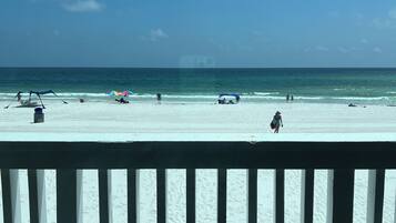 On the beach, sun loungers, beach towels