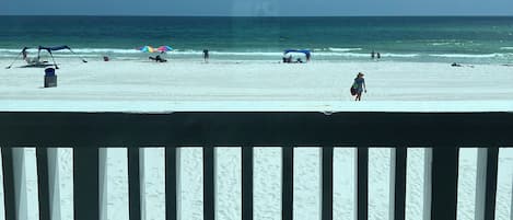 On the beach, sun-loungers, beach towels