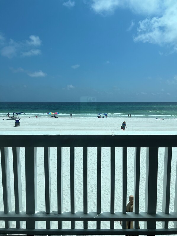On the beach, sun loungers, beach towels