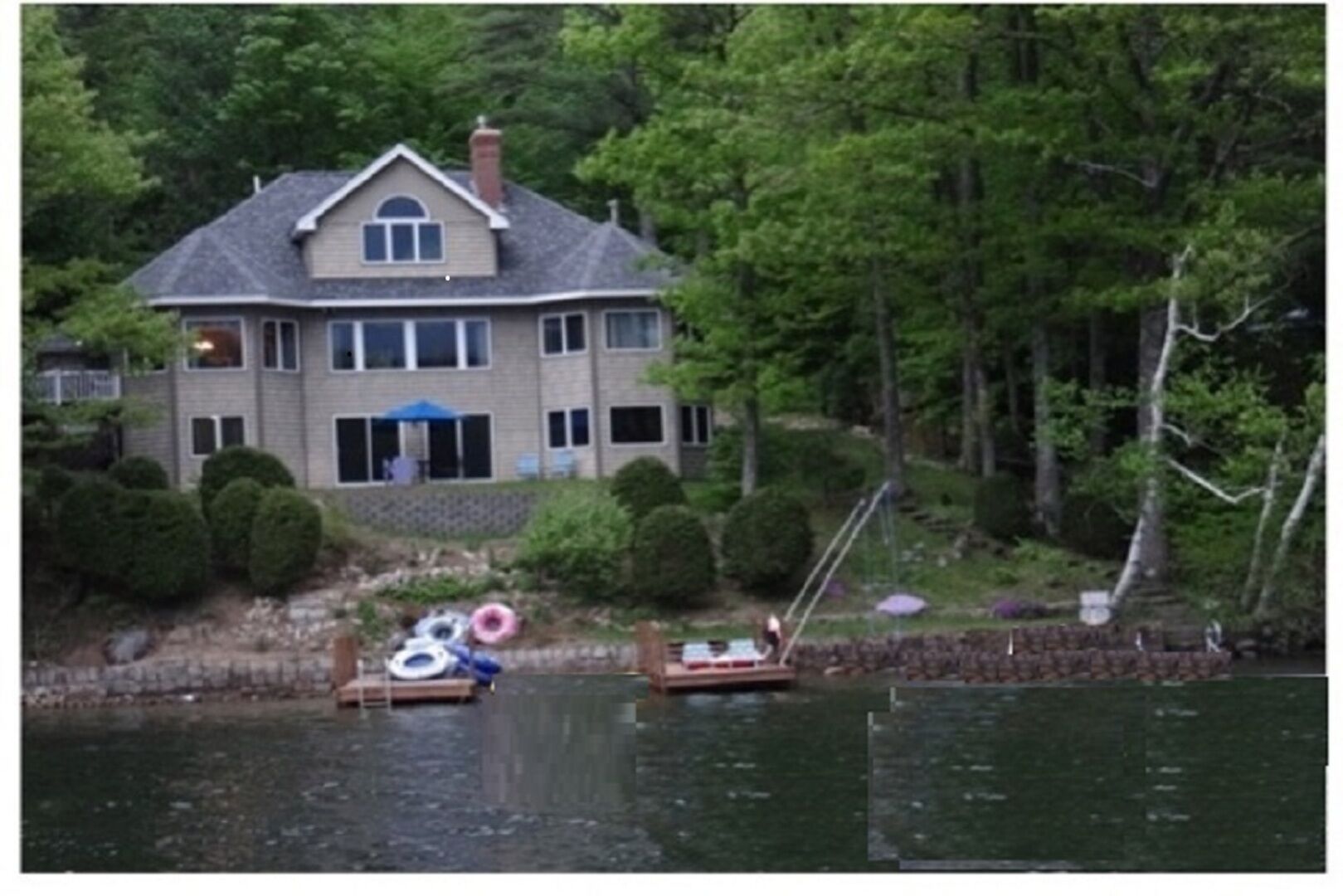 Lake Winnipesaukee waterfront, luxury family home with two 8x32 docks.