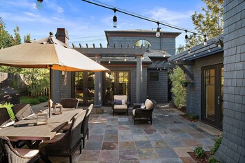 Great outdoor living space. Guesthouse straight ahead and studio on the right.