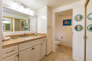 Combined shower/tub, hair dryer, towels, soap