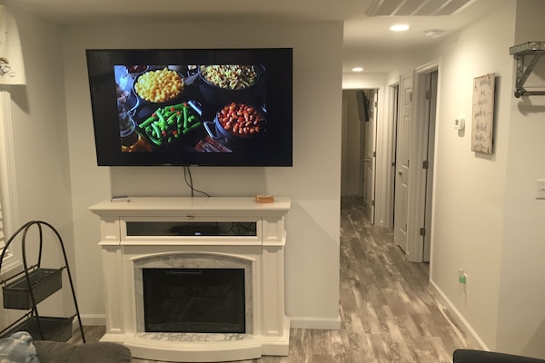 60" tv in living room with HD cable