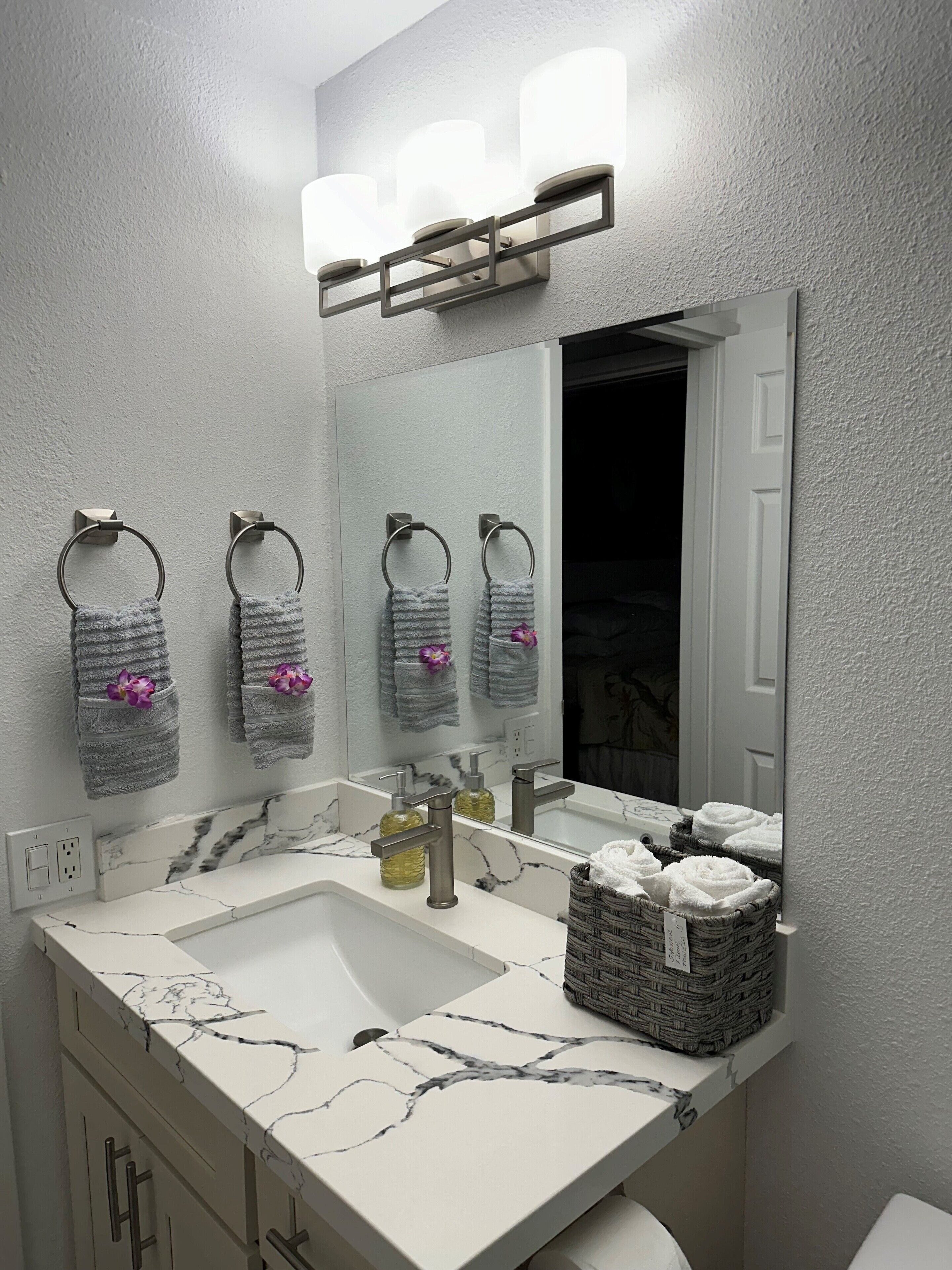 Combined shower/tub, hair dryer, towels, soap