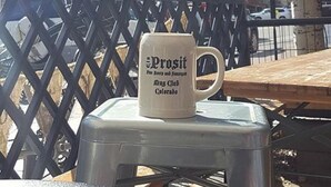 A mug on a metal chair with a mountain in the background. - Magnificent Mountain Side~Recently Remodeled (Frisco)
