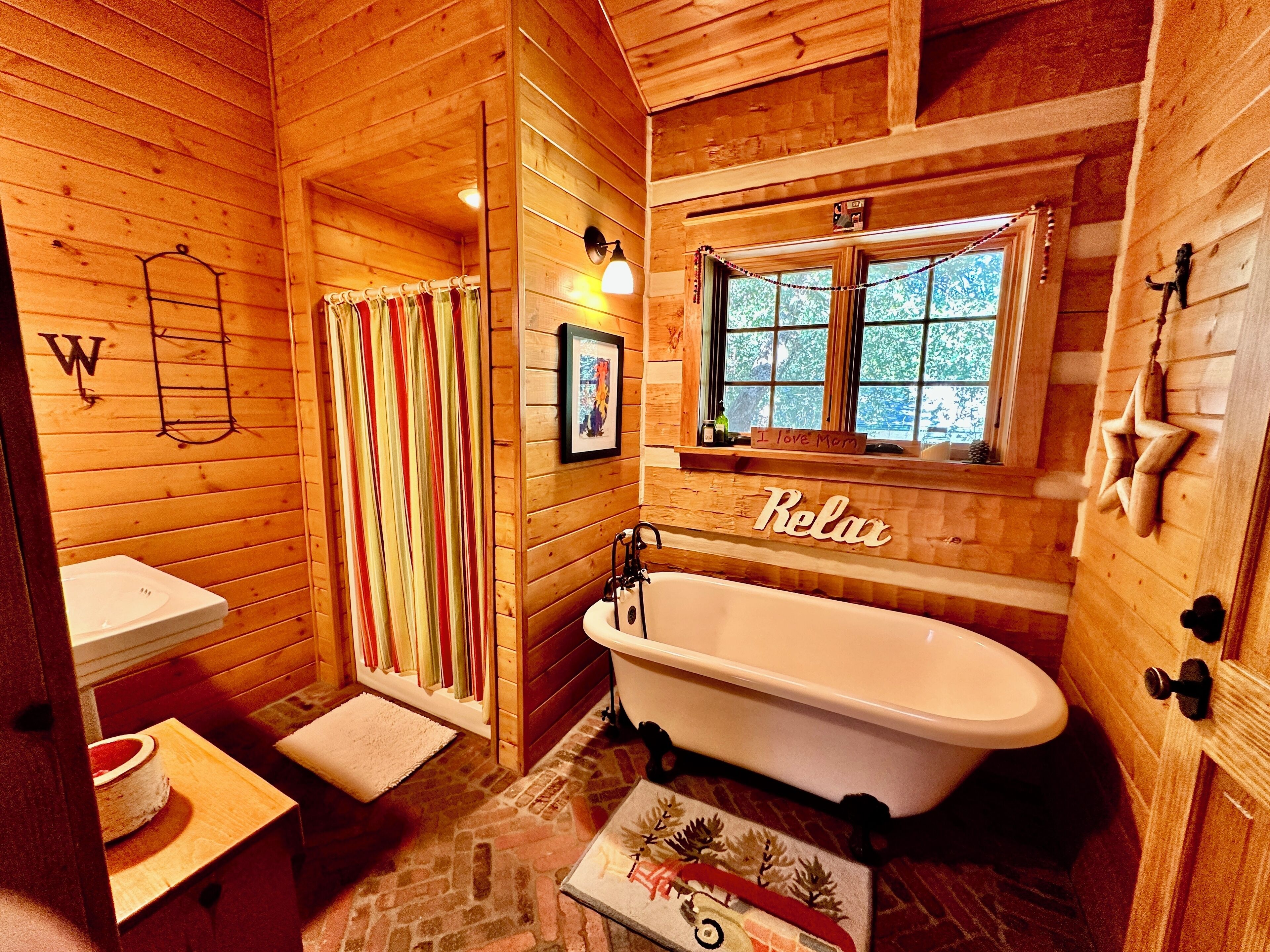 Bathtub, hair dryer, towels, soap