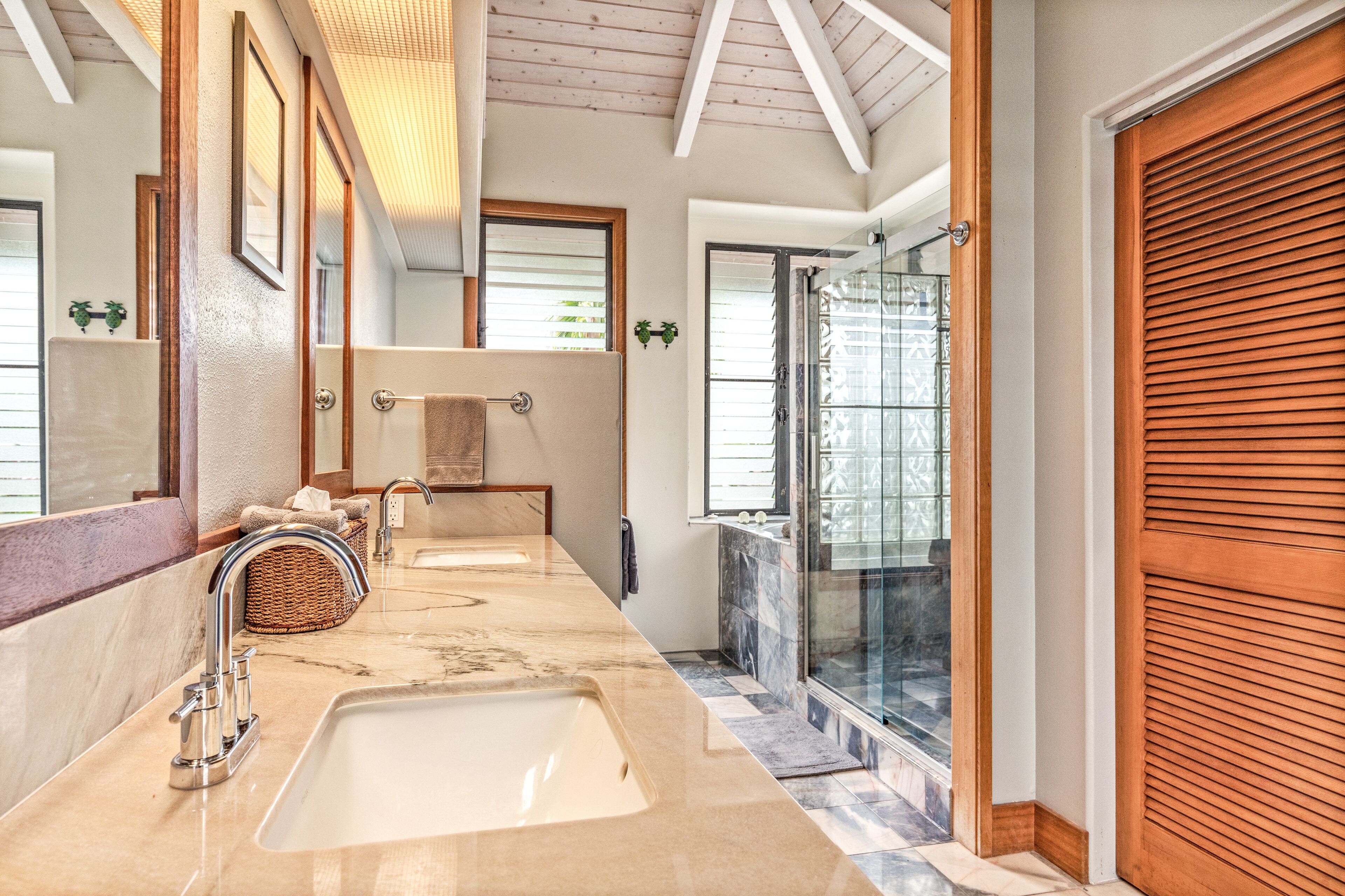 Bathtub, hair dryer, towels, toilet paper