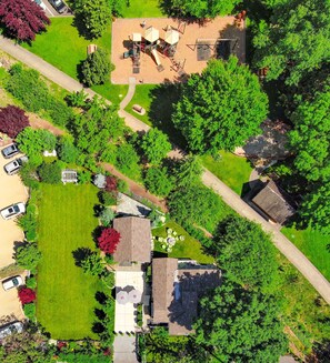 A residential area with a playground, a tennis court, and a garden. - TIGERS DEN -  #1 BEST LOCATION, ROMANTIC, STUNNING, STEPS TO BRITT FESTIVAL (Jacksonville)