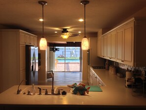 Fridge, microwave, oven, stovetop - Casa Del Rio, Tropical Resort Feel, Breathtaking River Views, Large Pool & Dock (Cape Coral)
