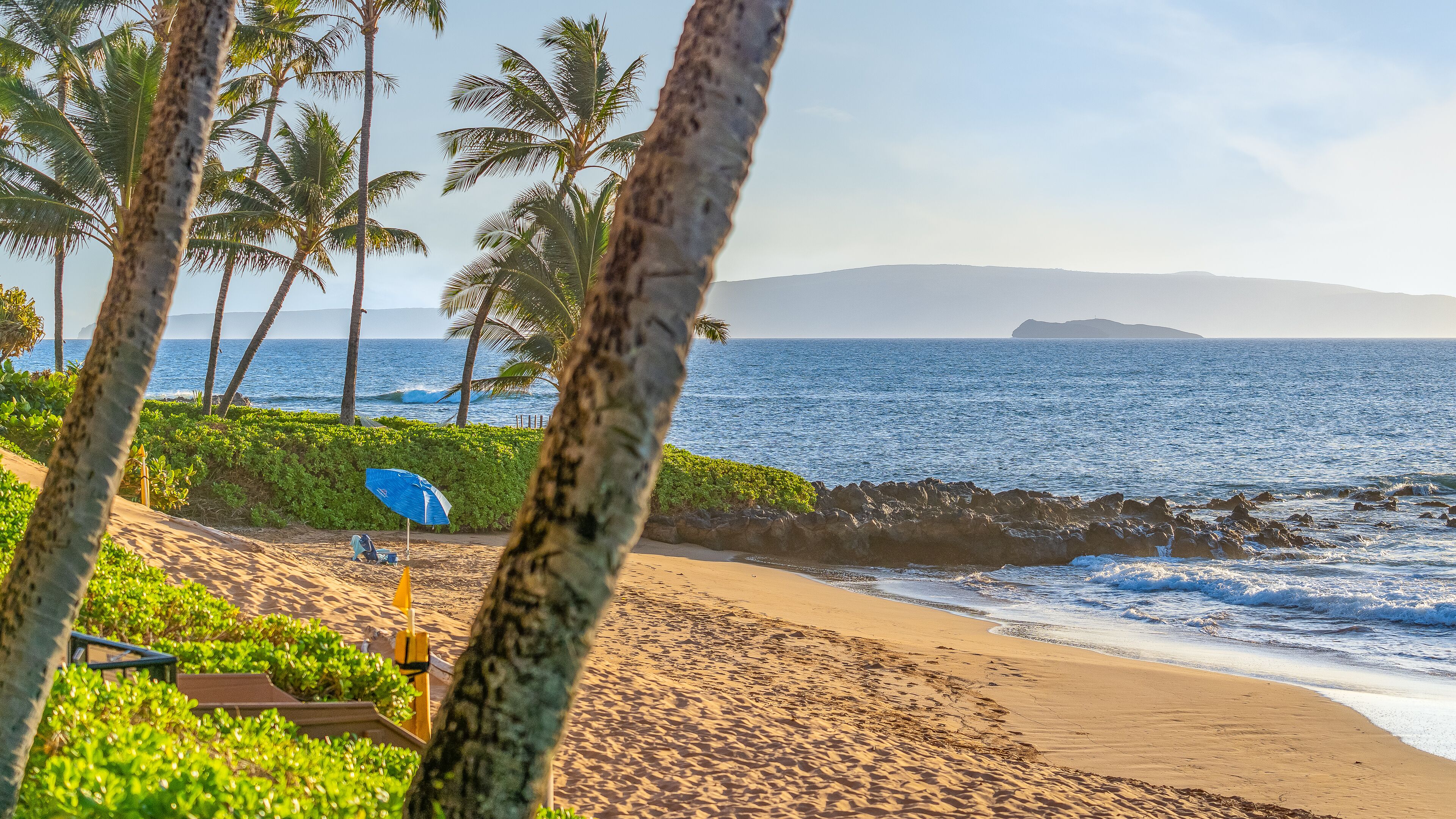 On the beach, sun loungers, beach towels
