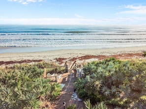 On the beach, sun loungers, beach towels