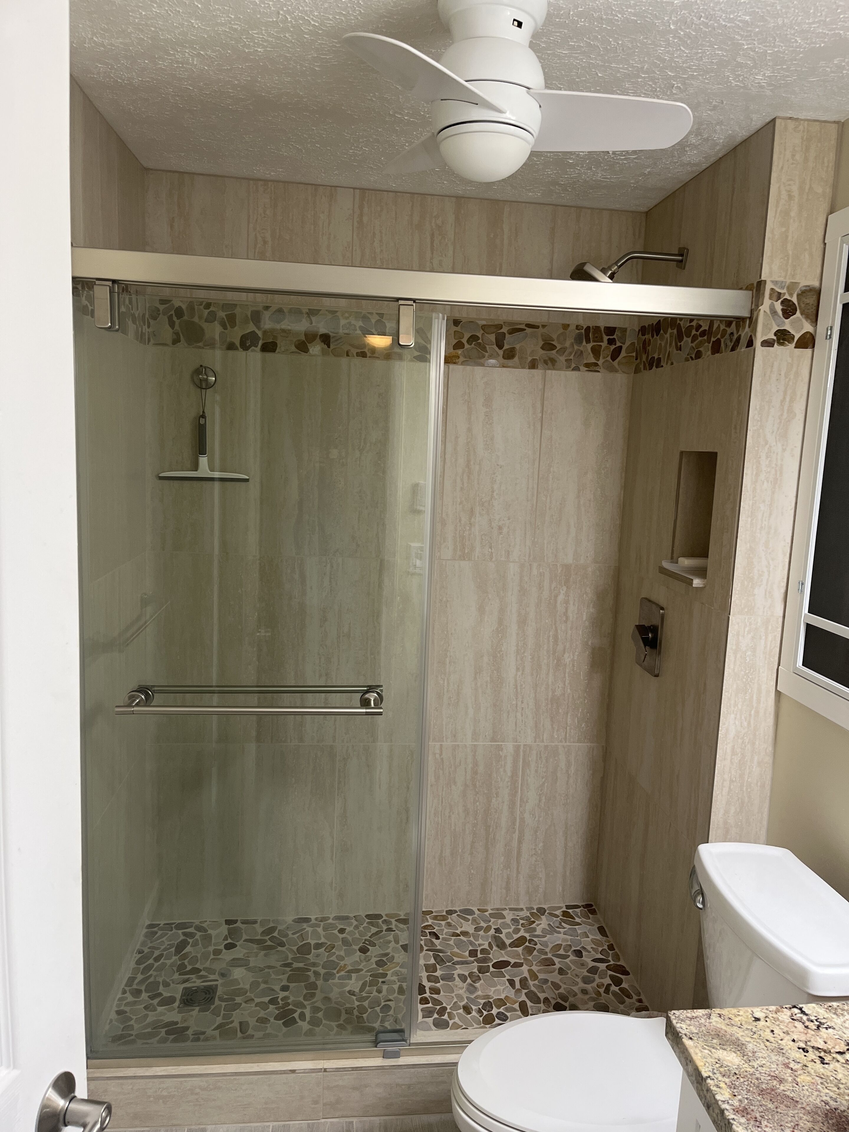 Combined shower/tub, hair dryer, towels, toilet paper