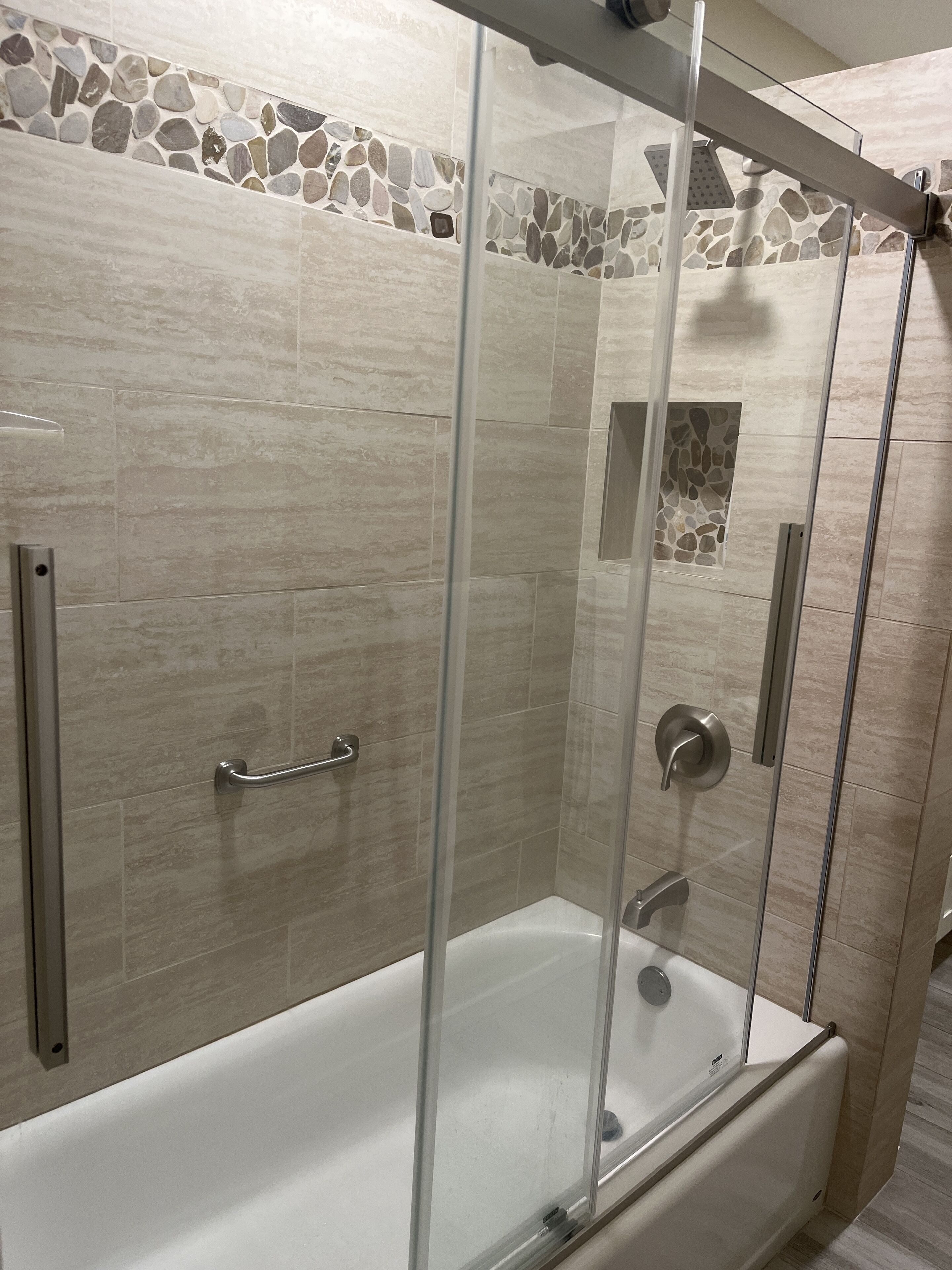 Combined shower/tub, hair dryer, towels, toilet paper