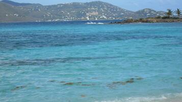 On the beach, sun-loungers, beach towels