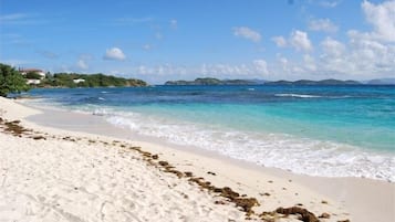 On the beach, sun-loungers, beach towels