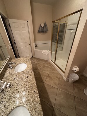 Combined shower/bathtub, hair dryer, towels, soap