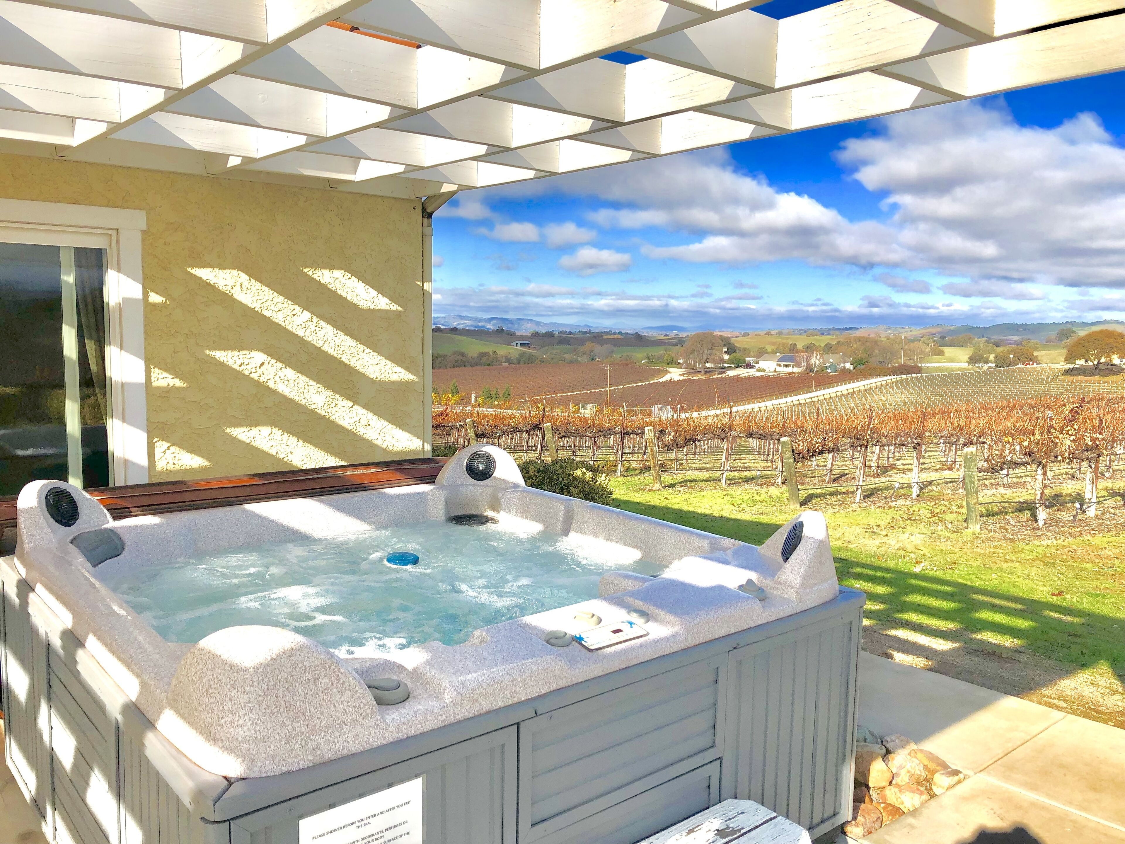Hot tub with amazing vineyard views!