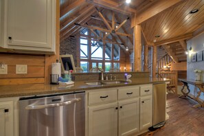 Microwave, coffee/tea maker, dining tables