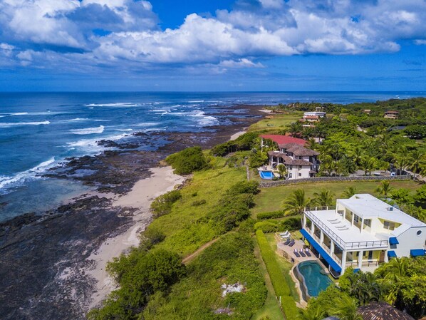 On the beach, sun-loungers, beach towels - Extraordinary Oceanfront Luxury Villa w/Infinity Pool & Full Concierge Service (Playa Negra)