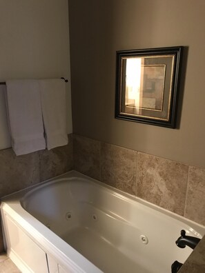 Shower, jetted bath, hair dryer, towels