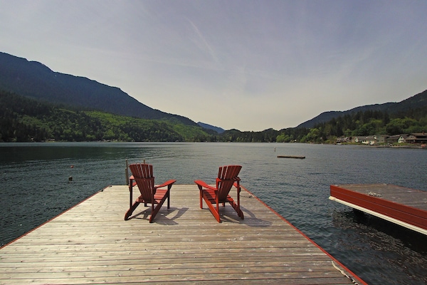 Relax in a handmade Adirondack and enjoy the view after wine tasting in town!