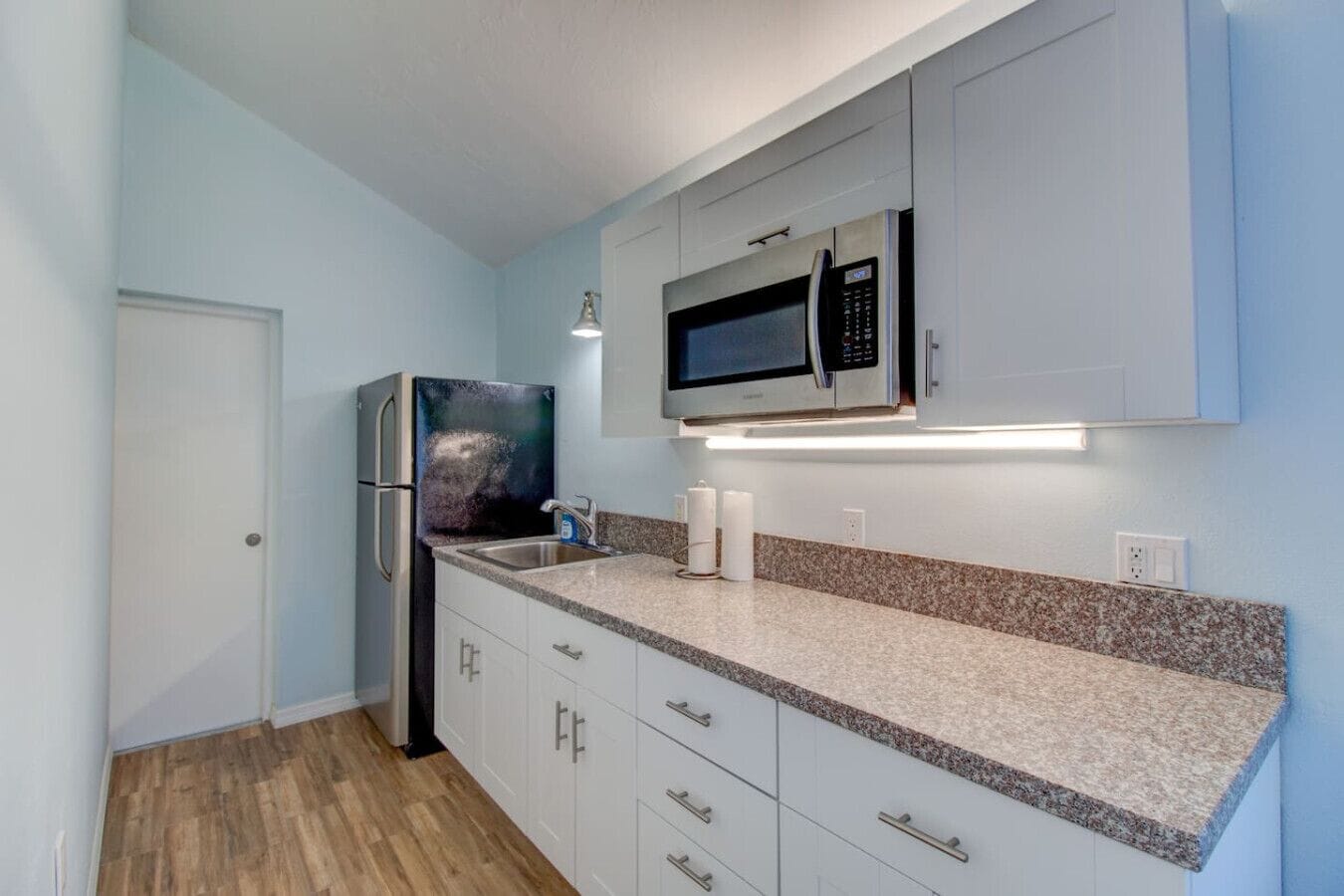 Fridge, microwave, coffee/tea maker, toaster