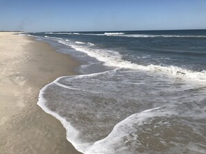 On the beach, sun-loungers, beach towels