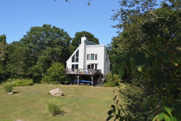 This side of the house faces Stonington Harbor, over a large yard w/ sea view