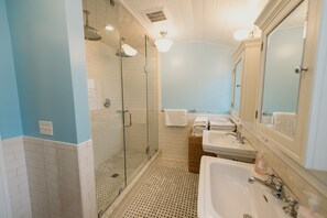 Bathtub, hair dryer, towels, soap