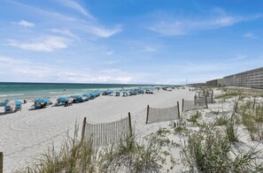 On the beach, sun-loungers, beach towels