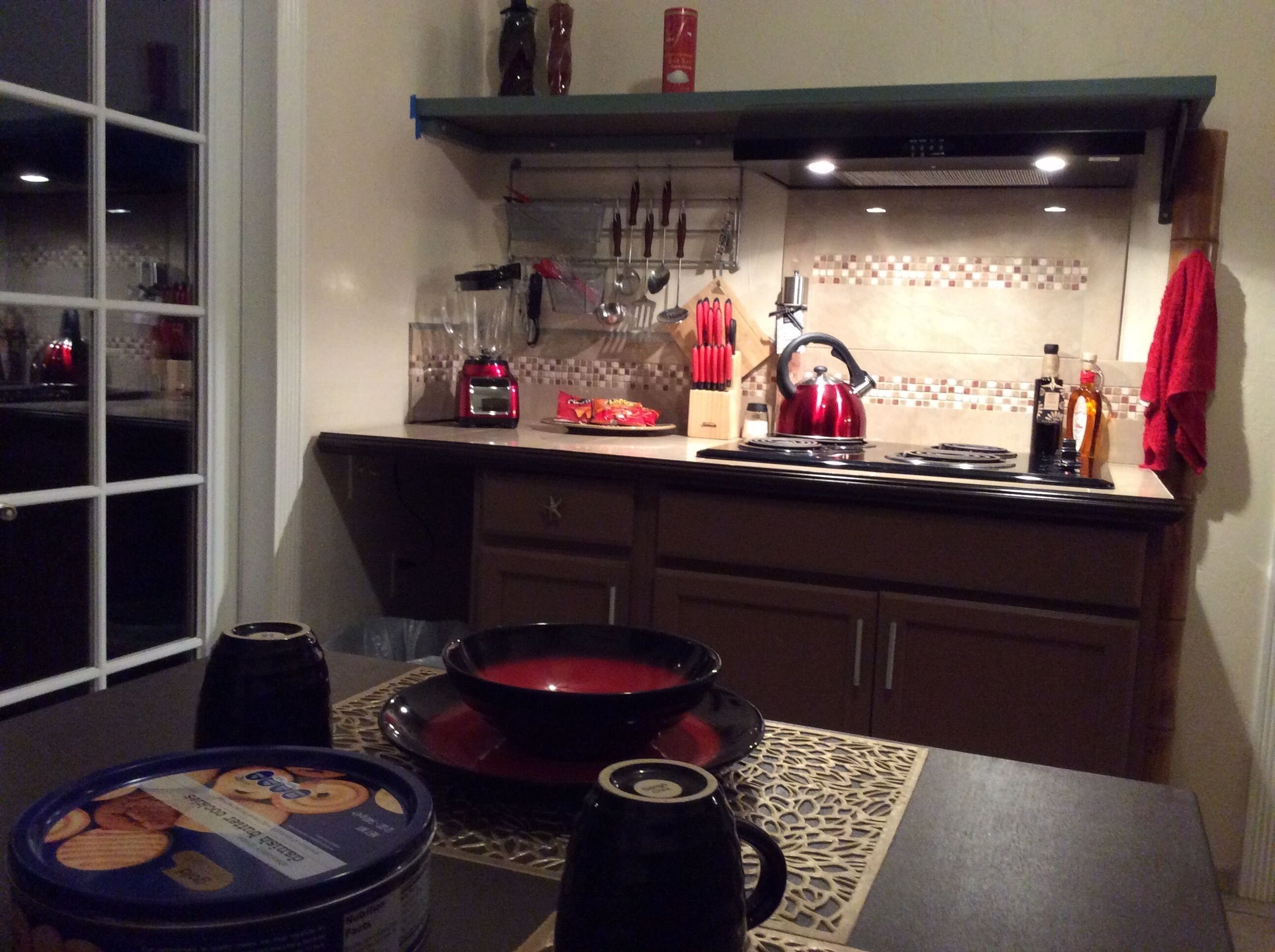 Fridge, microwave, stovetop, coffee/tea maker