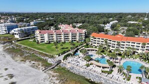 A resort with multiple buildings, a large pool area, and a beach. - Oceanfront King & Prince Villa | Breathtaking Ocean Views | Access to Resort Amenities! (St. Simons Island)