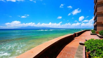 On the beach, sun-loungers, beach towels