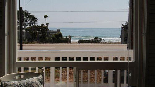 Coastal VIEWS with easy SURF ACCESS.   Home with yard and spa...pets considered!