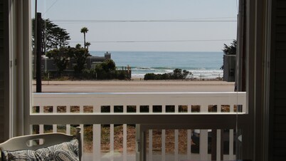 Coastal VIEWS with easy SURF ACCESS.   Home with yard and spa...pets considered!