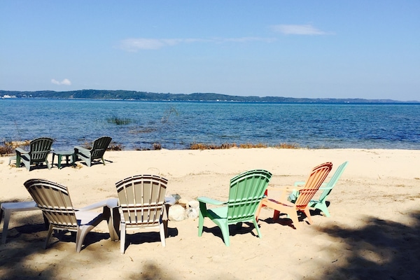 On the beach, sun loungers, beach towels