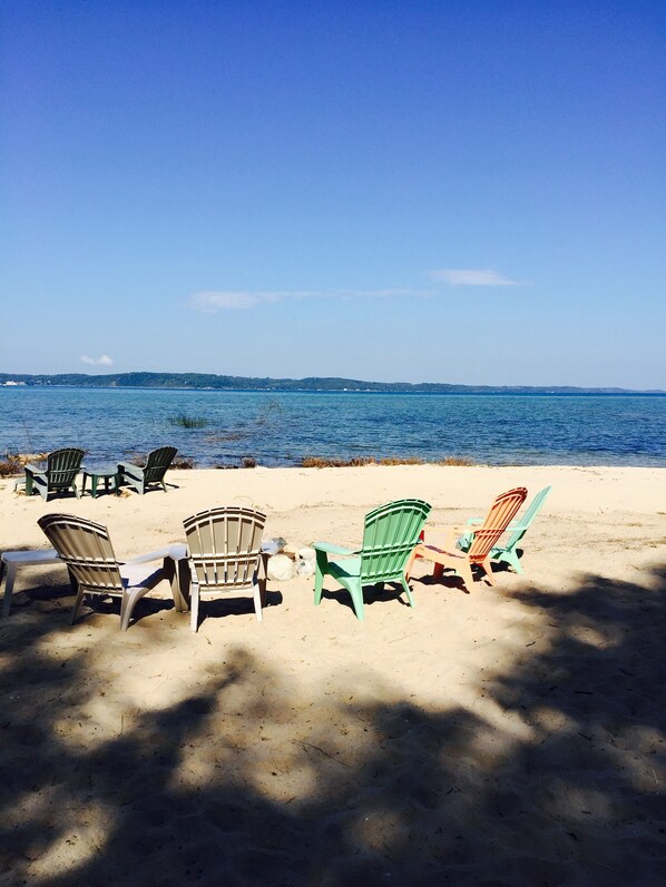 On the beach, sun loungers, beach towels