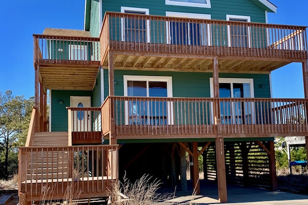 This charming property offers a reverse floor plan and deck access all rooms.