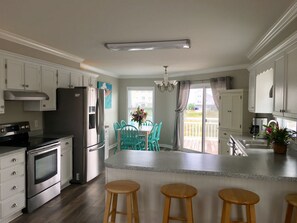 Fridge, microwave, oven, stovetop - Canal Front Home with Boat Access & Golf Cart! Very Close to Beach Access! (Ocean Isle Beach)