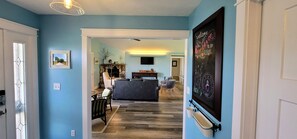 Smart TV, fireplace, books, stereo