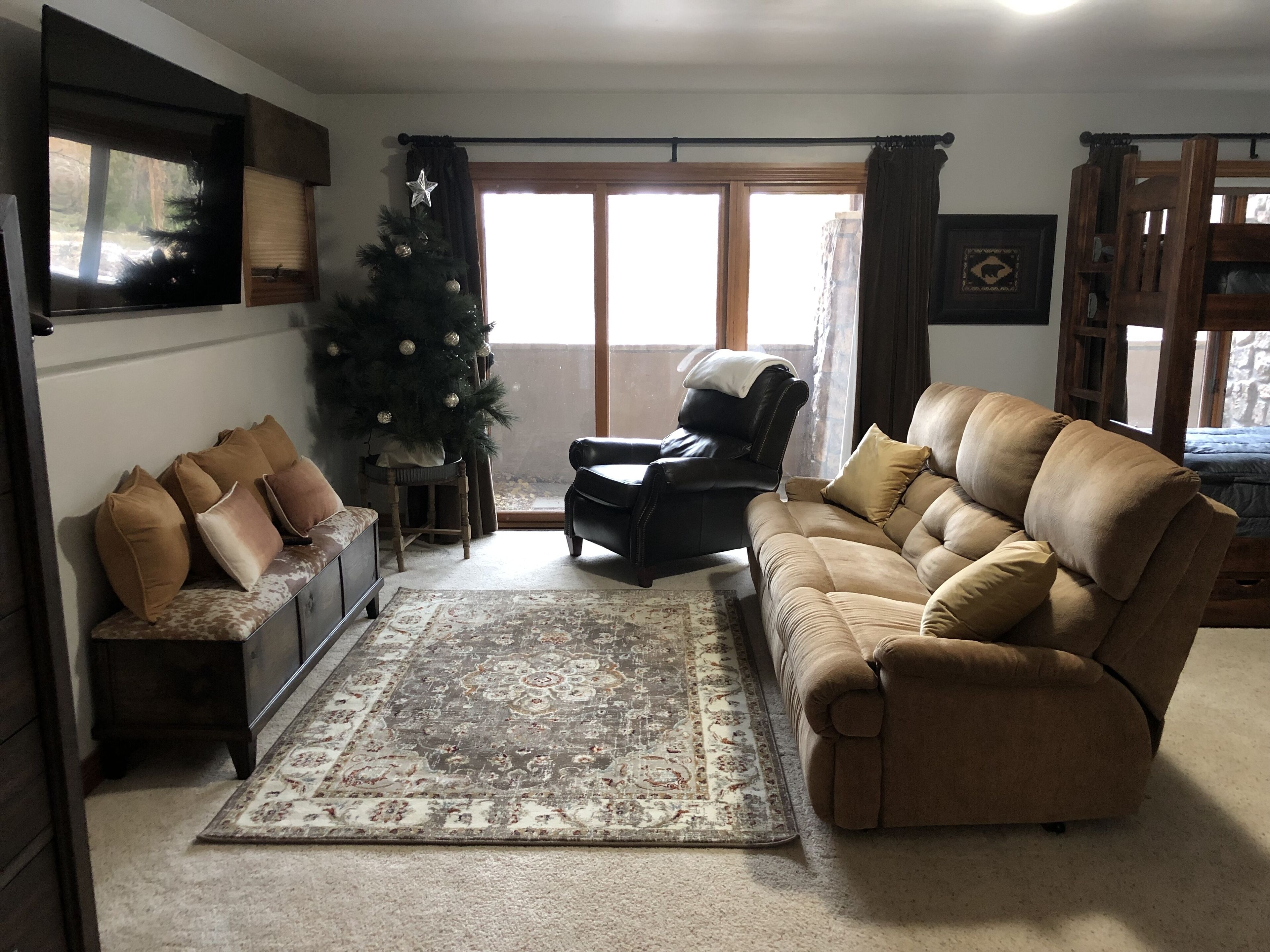 Lower level with 4 bunks, large screen TV, and private full bath