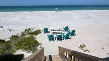 On the beach, sun-loungers, beach towels