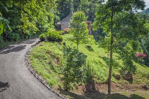Escape to a serene retreat surrounded by lush greenery and a peaceful atmosphere.