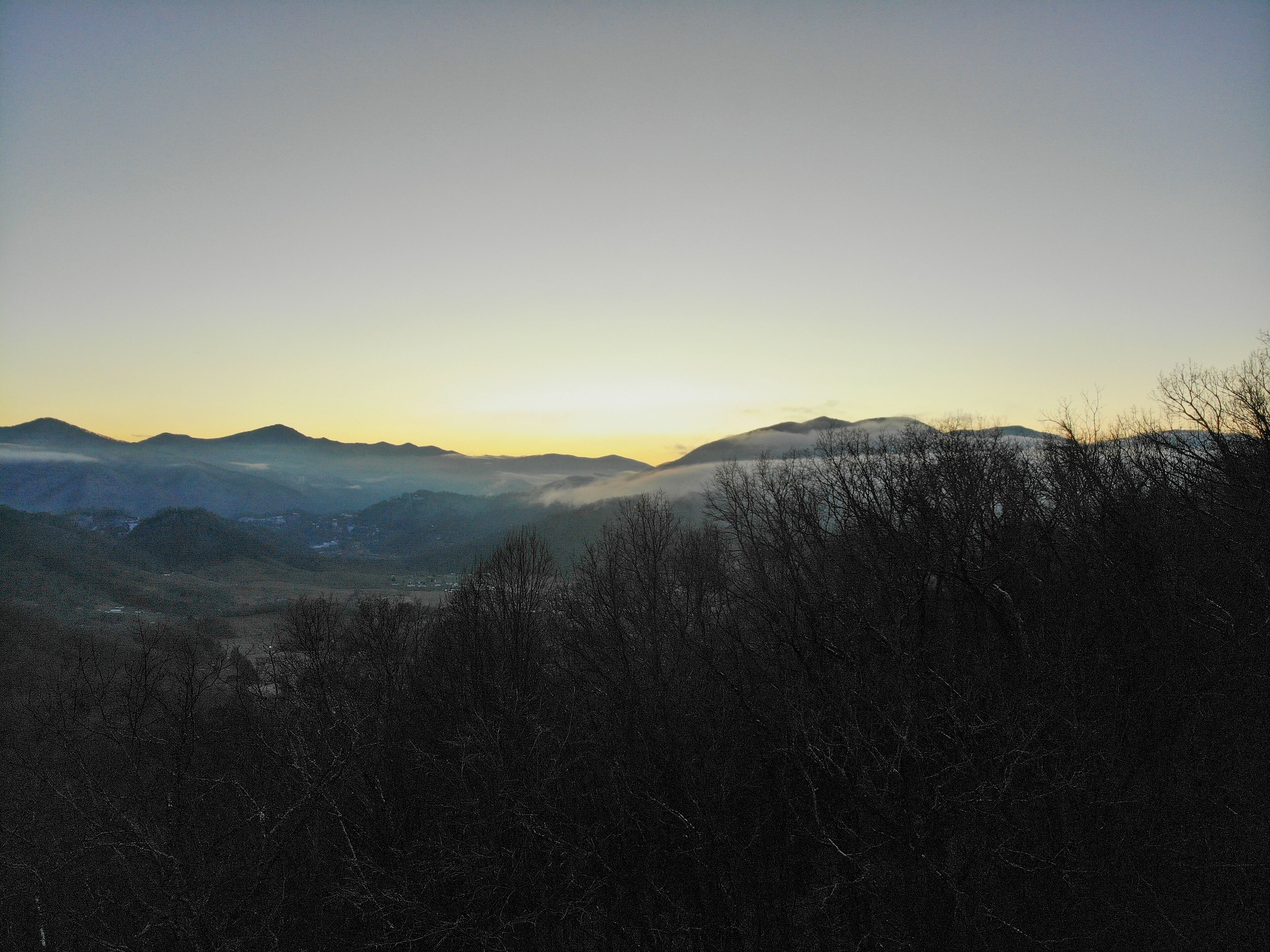 A mountainous landscape with a clear sky.