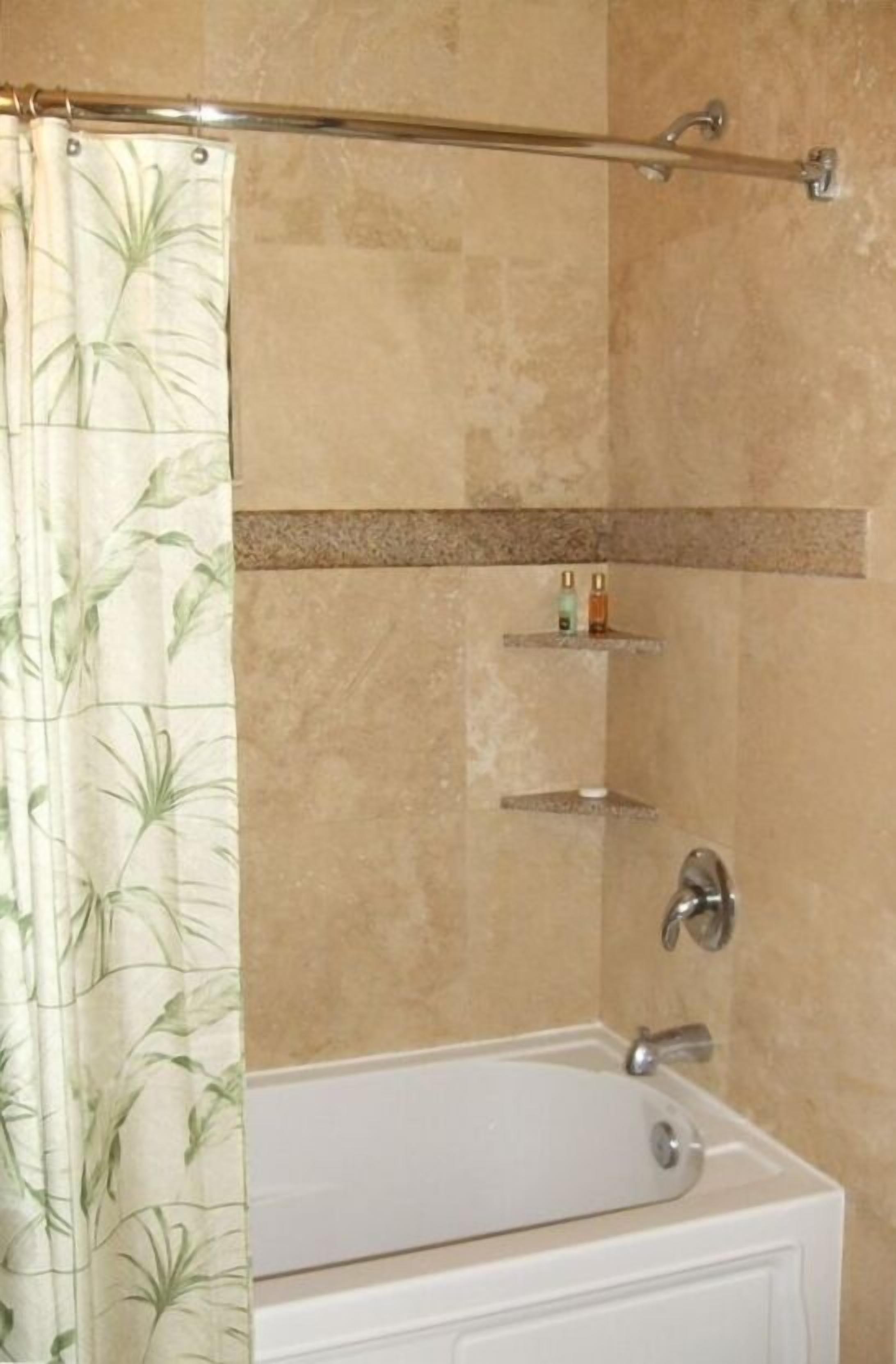 Combined shower/tub, hair dryer, towels, shampoo